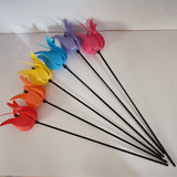 Colorful tulip windmill, as it spins with the wind, is both romantic and perfect for decorating the center of the garden/veranda.